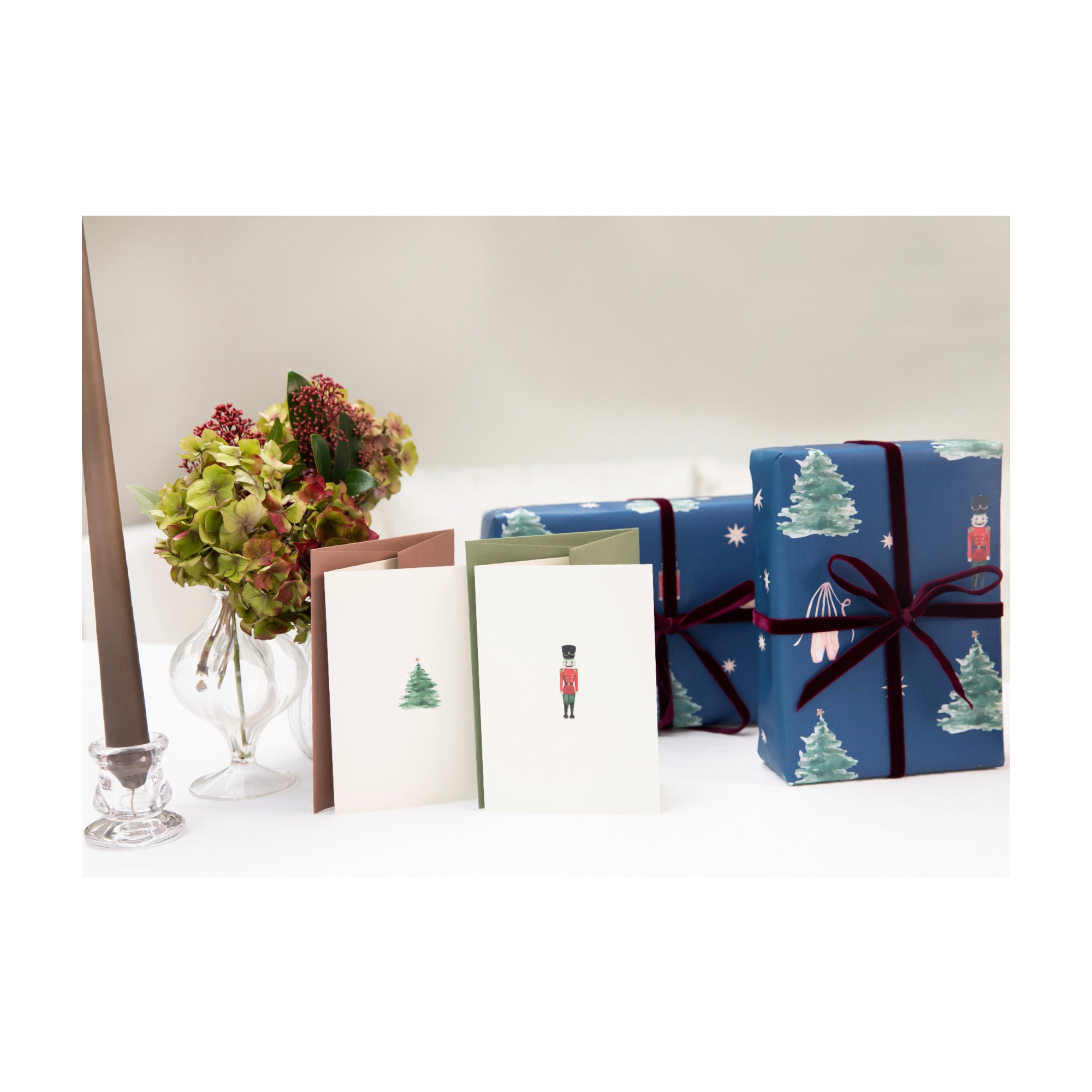 Luxury Christmas Card by Memo Press with a watercolour illustration of a traditional Christmas Tree with a single star on top and comes with a nubuck brown envelope made in Britain