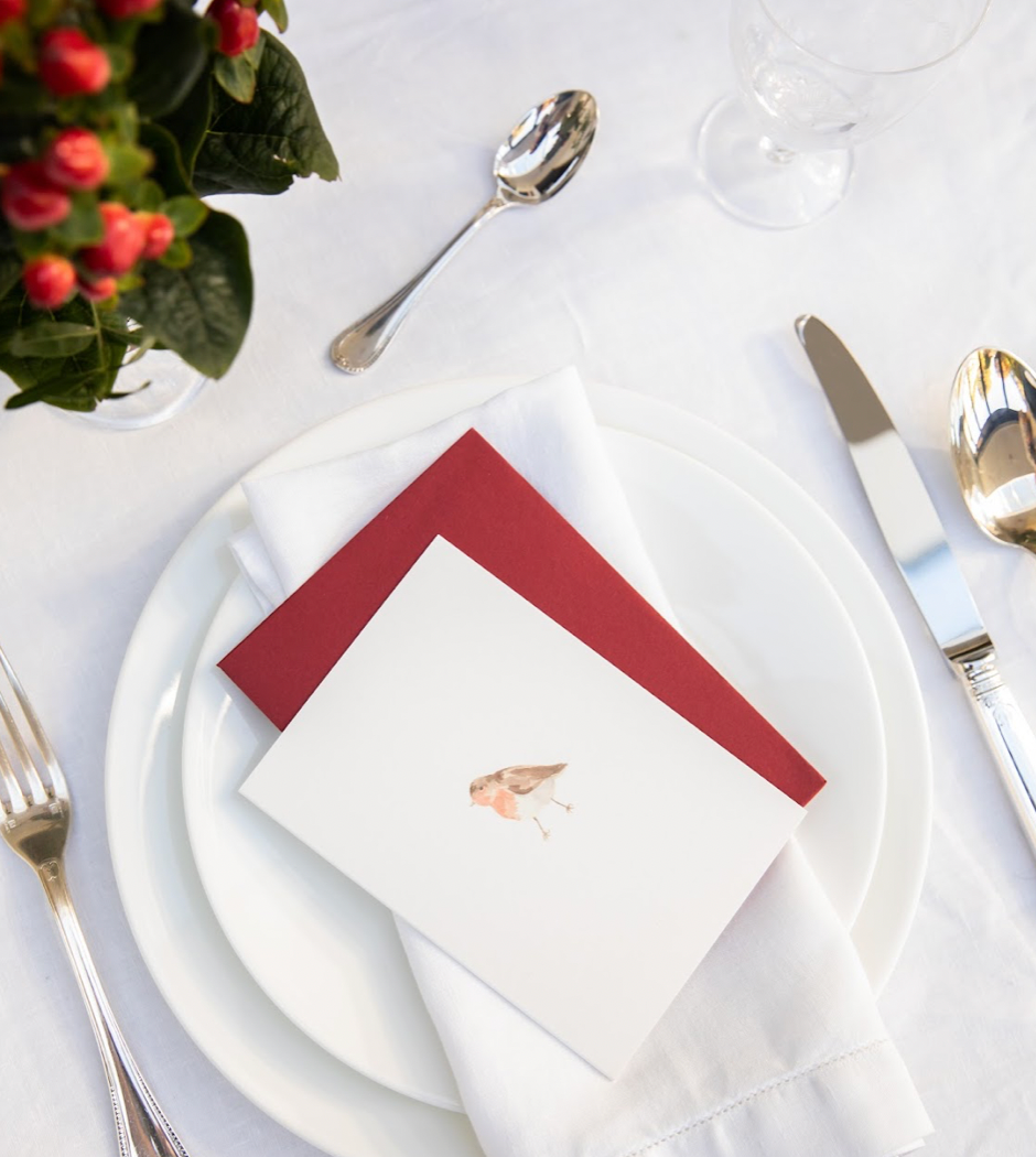 Luxury Christmas Card by Memo Press with a watercolour illustration of a Robin Redbreast and comes with a scarlet envelope made in Britain
